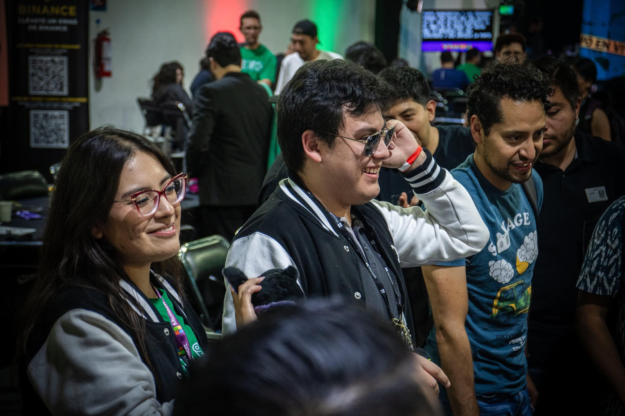 Attendees laughing between one talk and the next